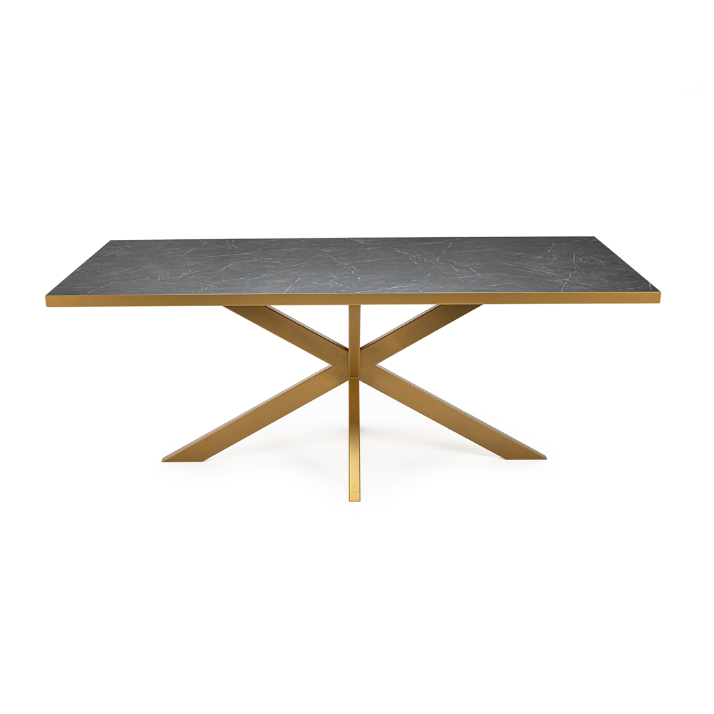 Grote rechthoekige eettafel met een zwart marmeren blad en goudkleurige metalen x-vormige poten.
